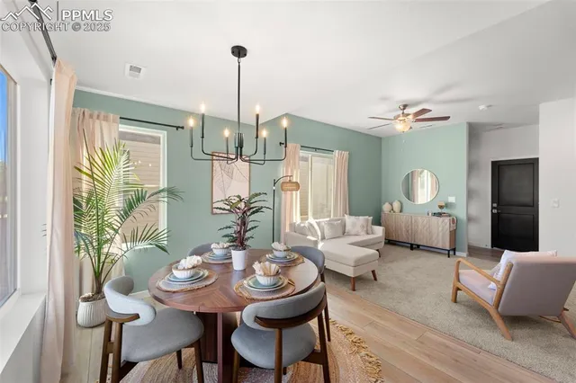 a view of a livingroom with furniture and window