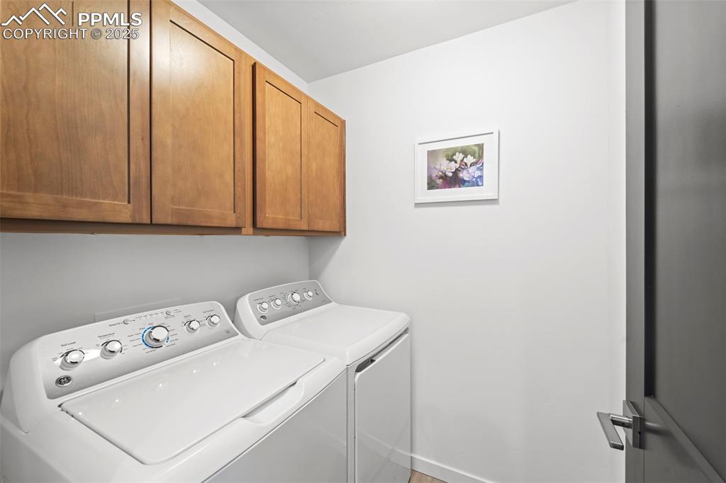 1920 Erin Loop Colorado Springs, CO 80918 - Photo 24 of 26 a utility room with dryer and washer