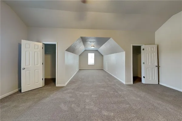 a view of a hallway with closet