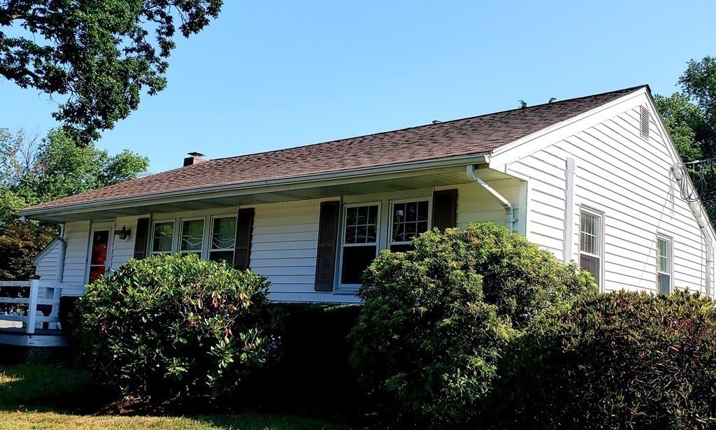 792 Ash Street Brockton, MA 02301 - Photo 36 of 42 a front view of a house with garden