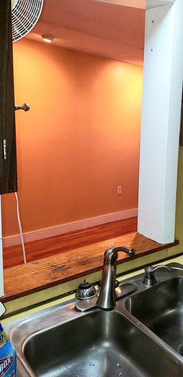 792 Ash Street Brockton, MA 02301 - Photo 41 of 42 a view of a room with wooden floor