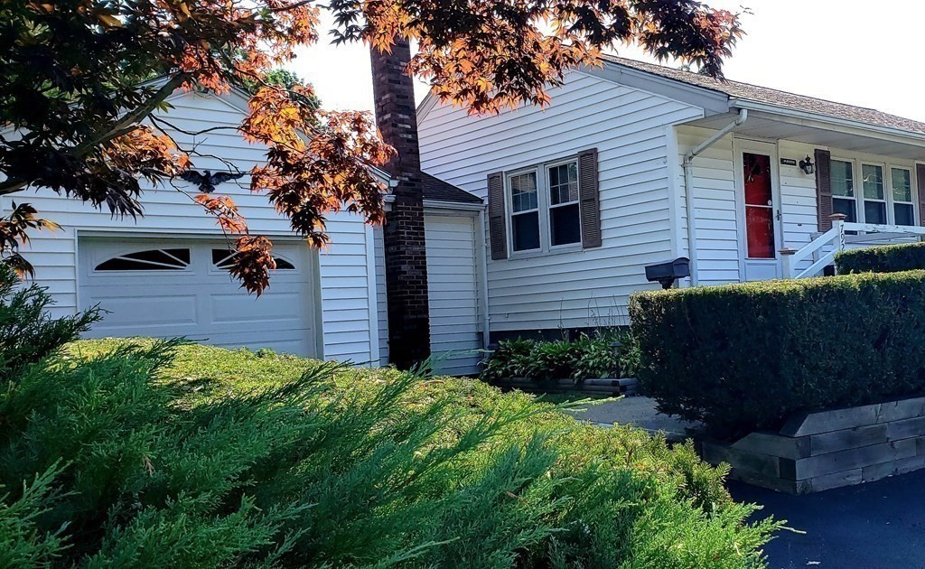 792 Ash Street Brockton, MA 02301 - Photo 5 of 42 a view of a house with a backyard
