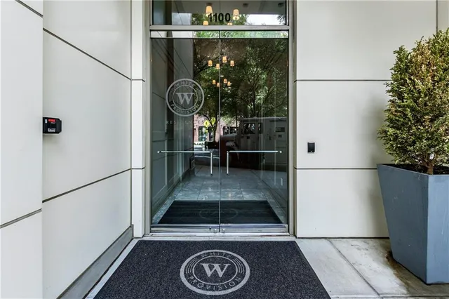 a view of gallery with windows