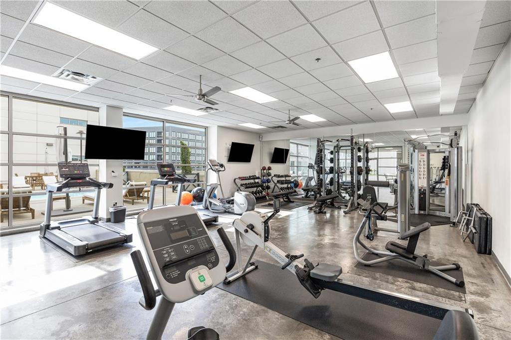 1100 Howell Mill Road Northwest, Unit 404 Atlanta, GA 30318 - Photo 36 of 45 a view of a room with gym equipment