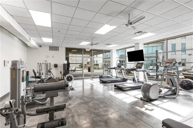 a view of a patio with a table and chairs