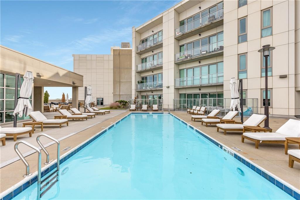1100 Howell Mill Road Northwest, Unit 404 Atlanta, GA 30318 - Photo 41 of 45 a view of swimming pool with outdoor seating