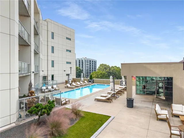 a front view of a building with a street