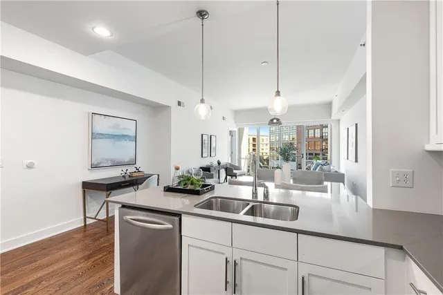 a kitchen with counter top space and sink