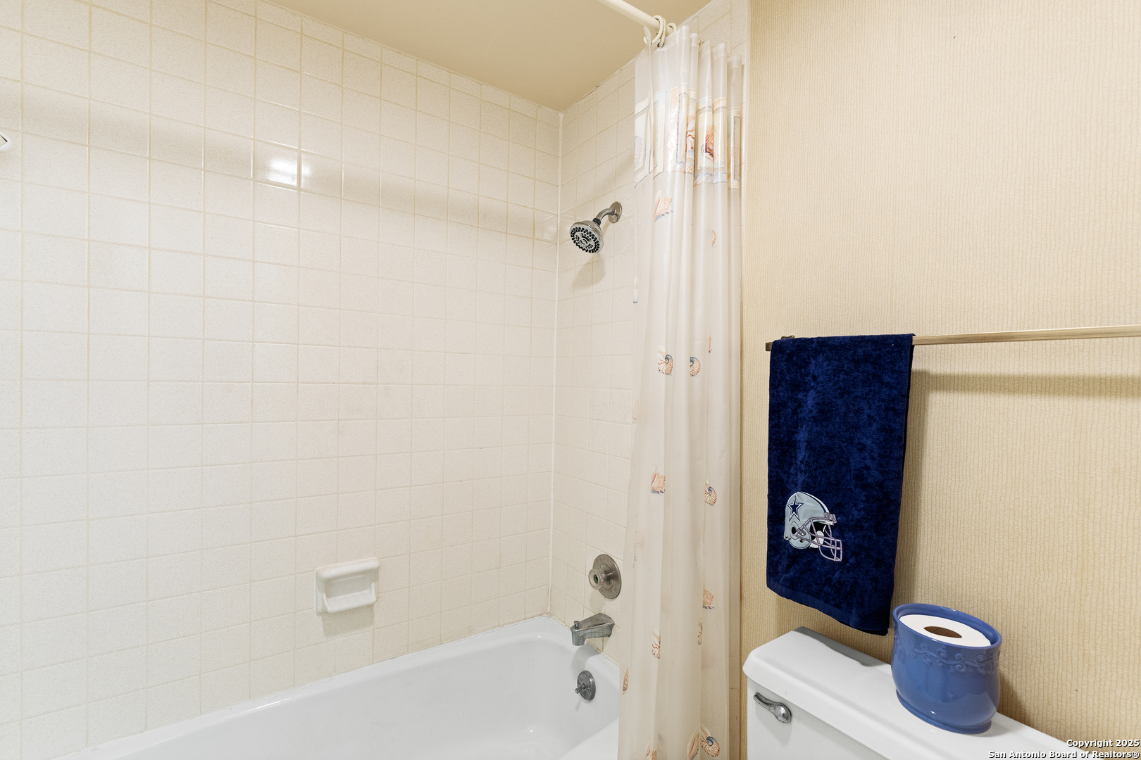 3678 Hidden Drive, Unit 1301 San Antonio, TX 78217 - Photo 11 of 47 a bathroom with a toilet and a shower