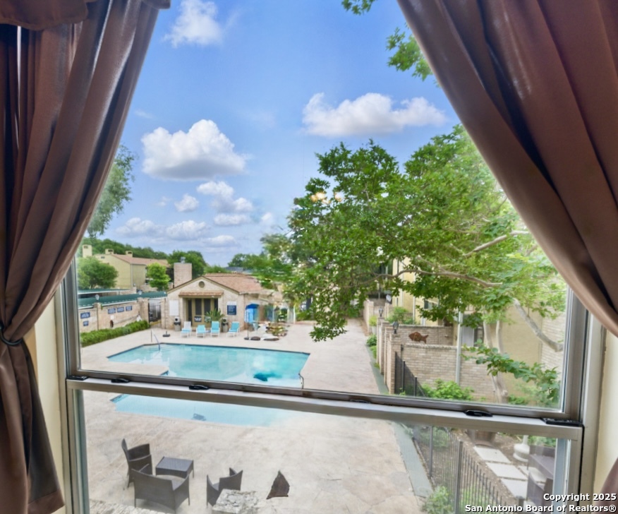 3678 Hidden Drive, Unit 1301 San Antonio, TX 78217 - Photo 23 of 47 a front view of a house with garden