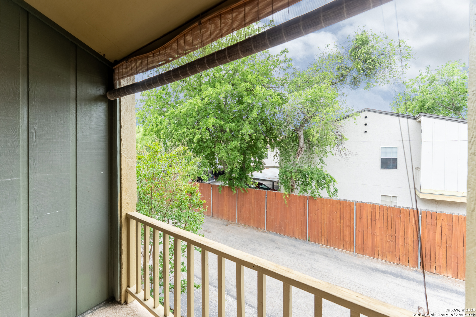 3678 Hidden Drive, Unit 1301 San Antonio, TX 78217 - Photo 25 of 47 a view of a balcony with wooden floor