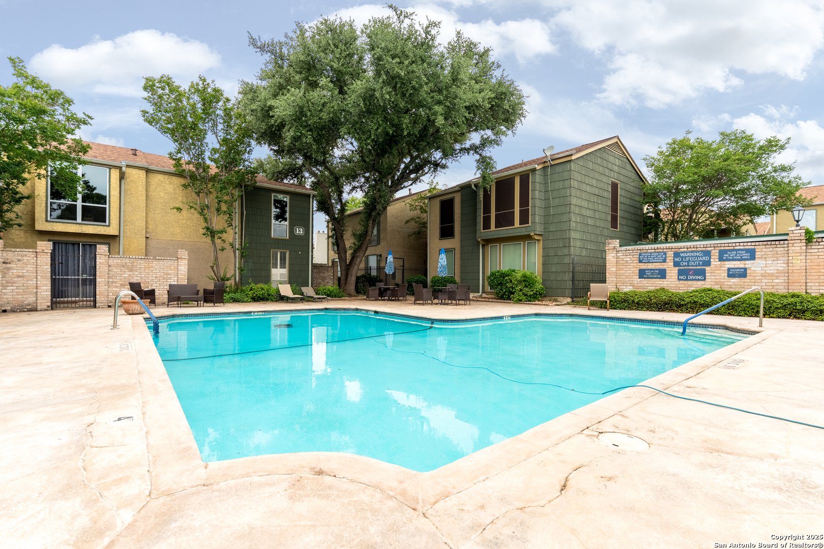 3678 Hidden Drive, Unit 1301 San Antonio, TX 78217 - Photo 28 of 47 a view of a house with swimming pool