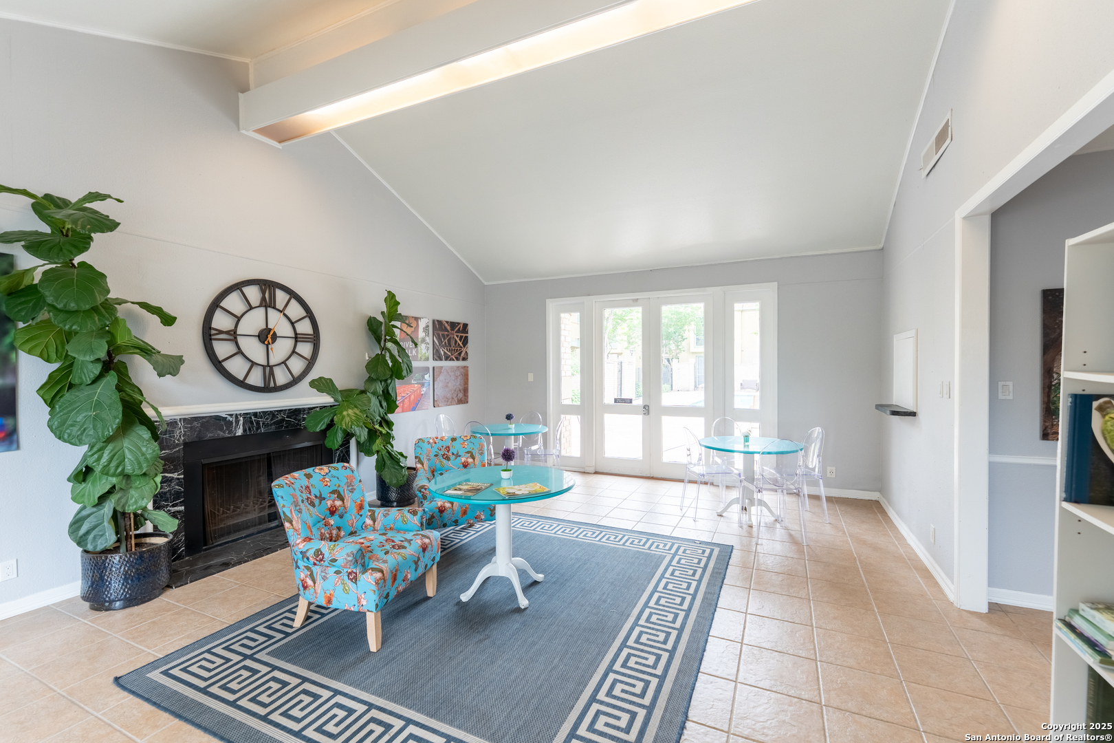 3678 Hidden Drive, Unit 1301 San Antonio, TX 78217 - Photo 40 of 47 a living room with furniture a rug a clock and a window