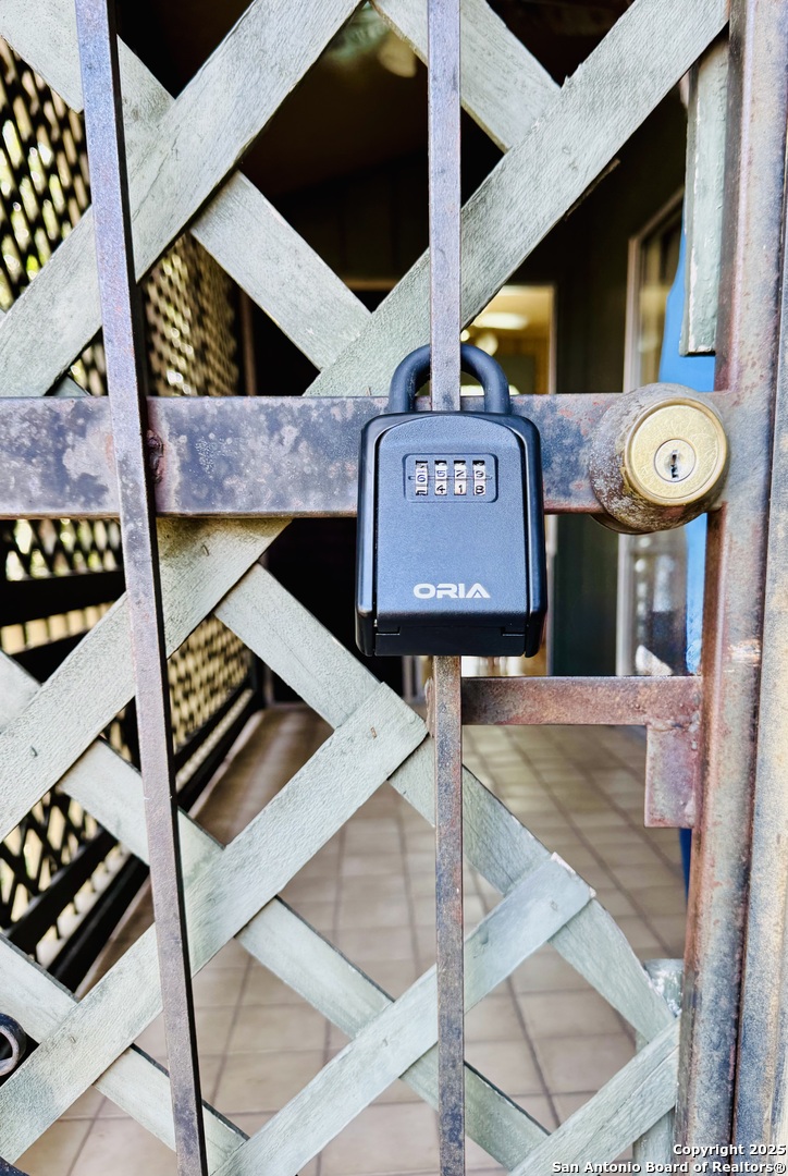 3678 Hidden Drive, Unit 1301 San Antonio, TX 78217 - Photo 44 of 47 a view of an entryway with a table and chairs