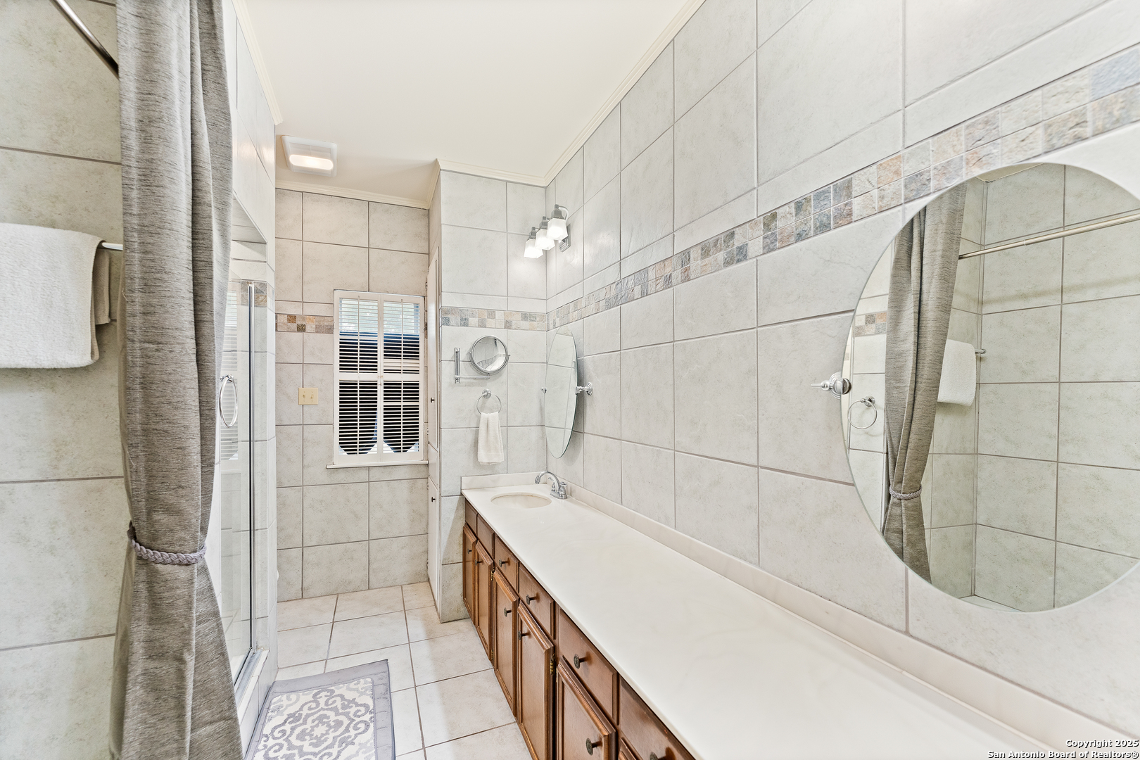 3678 Hidden Drive, Unit 1301 San Antonio, TX 78217 - Photo 6 of 47 a bathroom with a bathtub and shower