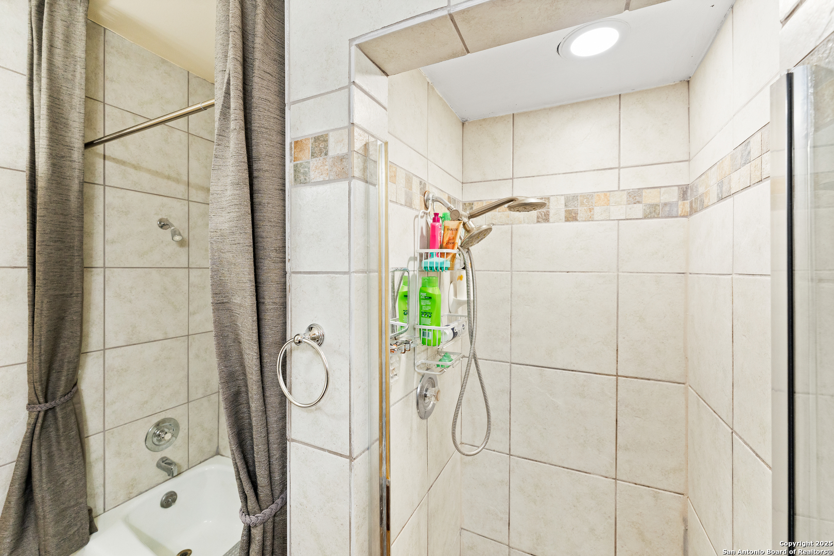 3678 Hidden Drive, Unit 1301 San Antonio, TX 78217 - Photo 7 of 47 a bathroom with a shower and toilet