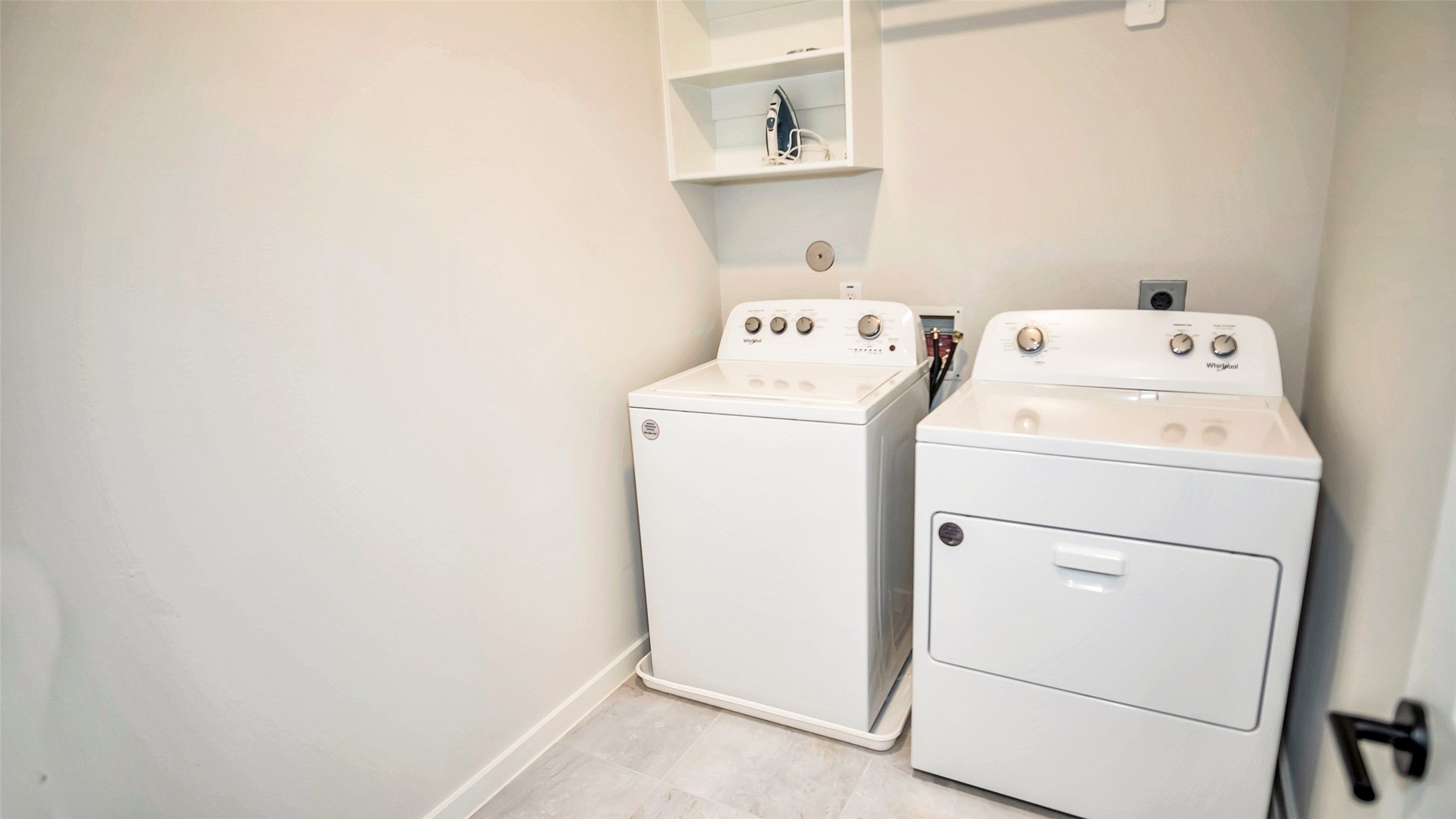 1919 Pueblo Nuevo Path Houston, TX 77077 - Photo 14 of 50 a utility room with dryer and washer