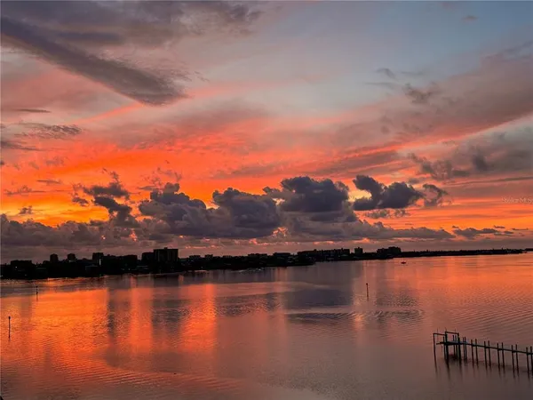 a view of lake and sunset