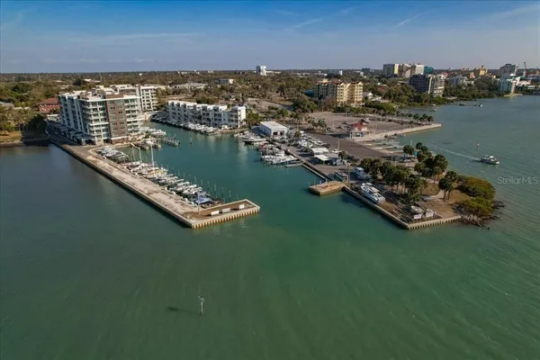a front view of a building with lake view and boat
