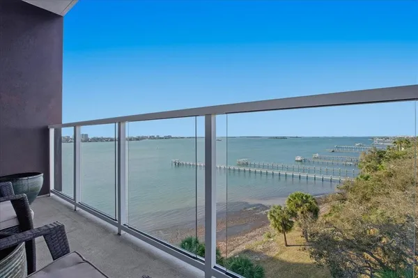 a view of a balcony with lake view