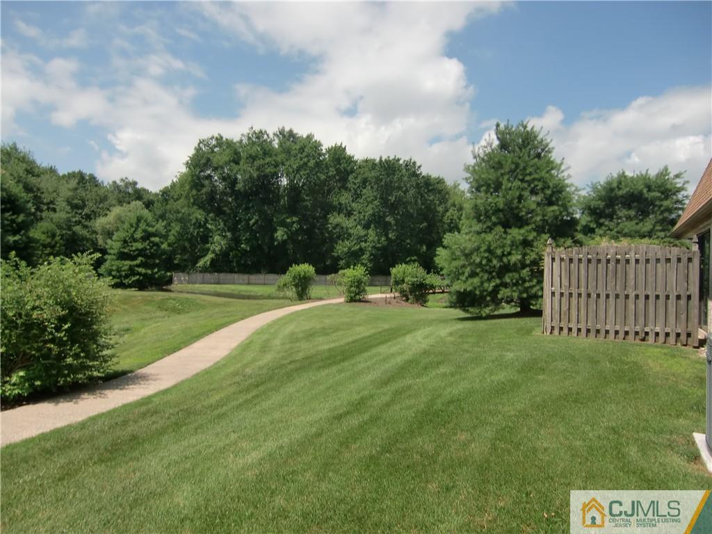 2 Park Gate Drive Edison, NJ 08820 - Photo 13 of 13 a view of a green field with wooden fence