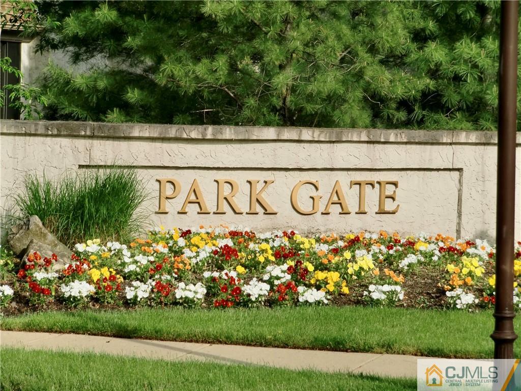 2 Park Gate Drive Edison, NJ 08820 - Photo 2 of 13 a view of front of house with a yard