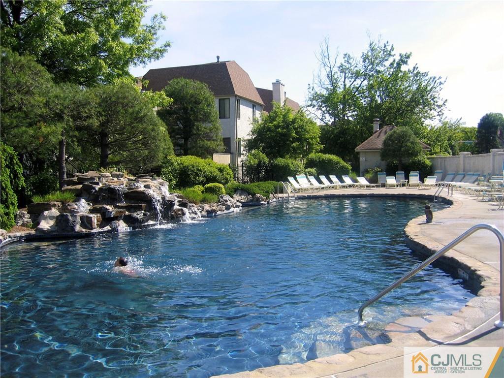 2 Park Gate Drive Edison, NJ 08820 - Photo 10 of 13 a view of a lake with a house