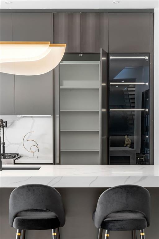 605 Hunnicutt Road Southeast Mableton, GA 30126 - Photo 12 of 35 a kitchen with a sink and a stove