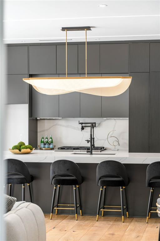605 Hunnicutt Road Southeast Mableton, GA 30126 - Photo 15 of 35 a kitchen with a table chairs and a stove