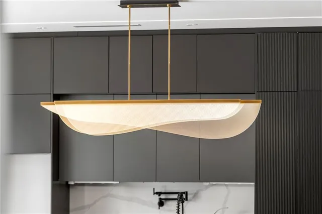 a room with a table and chairs