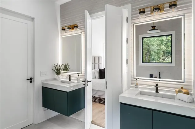 a bathroom with a bathtub and a window