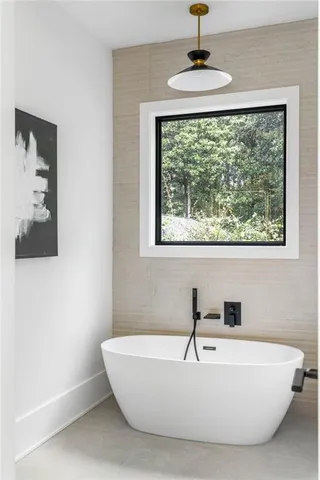 a workspace with furniture and a window