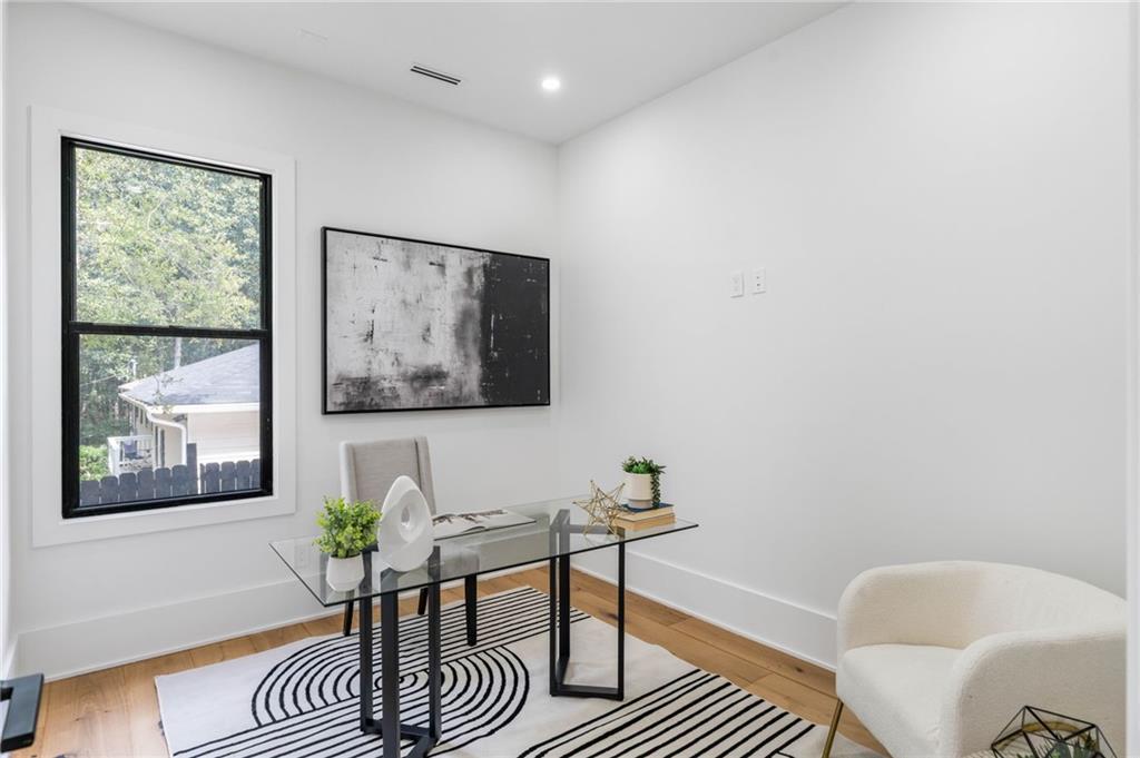 605 Hunnicutt Road Southeast Mableton, GA 30126 - Photo 28 of 35 a workspace with furniture and a window