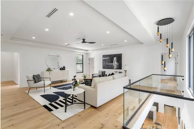 a living room with furniture and a rug