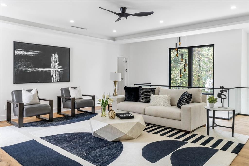 605 Hunnicutt Road Southeast Mableton, GA 30126 - Photo 31 of 35 a living room with furniture and a rug