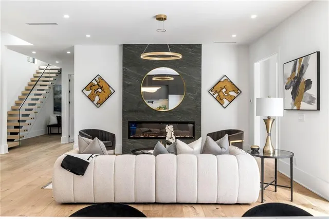 a bedroom with furniture and a window