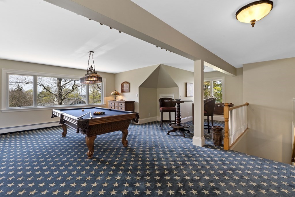 25 Foster Street Marblehead, MA 01945 - Photo 21 of 42 a living room with furniture and a window