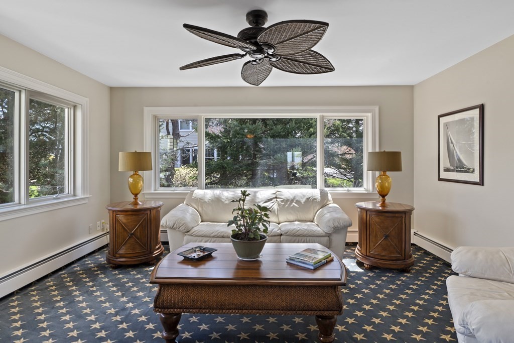 25 Foster Street Marblehead, MA 01945 - Photo 22 of 42 a living room with furniture and a window