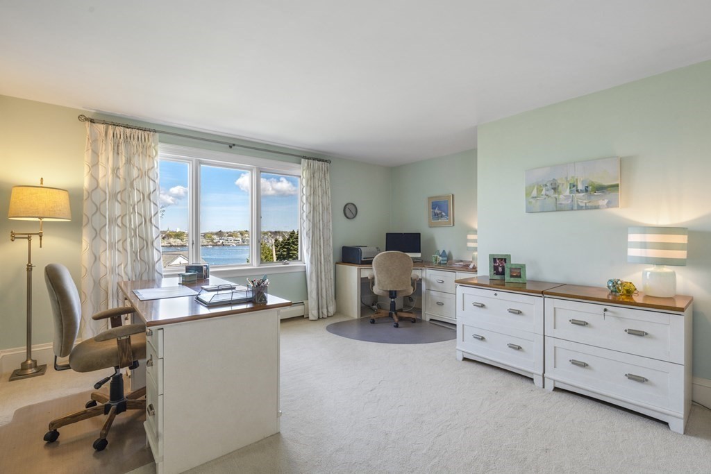 25 Foster Street Marblehead, MA 01945 - Photo 30 of 42 a room with furniture and a window
