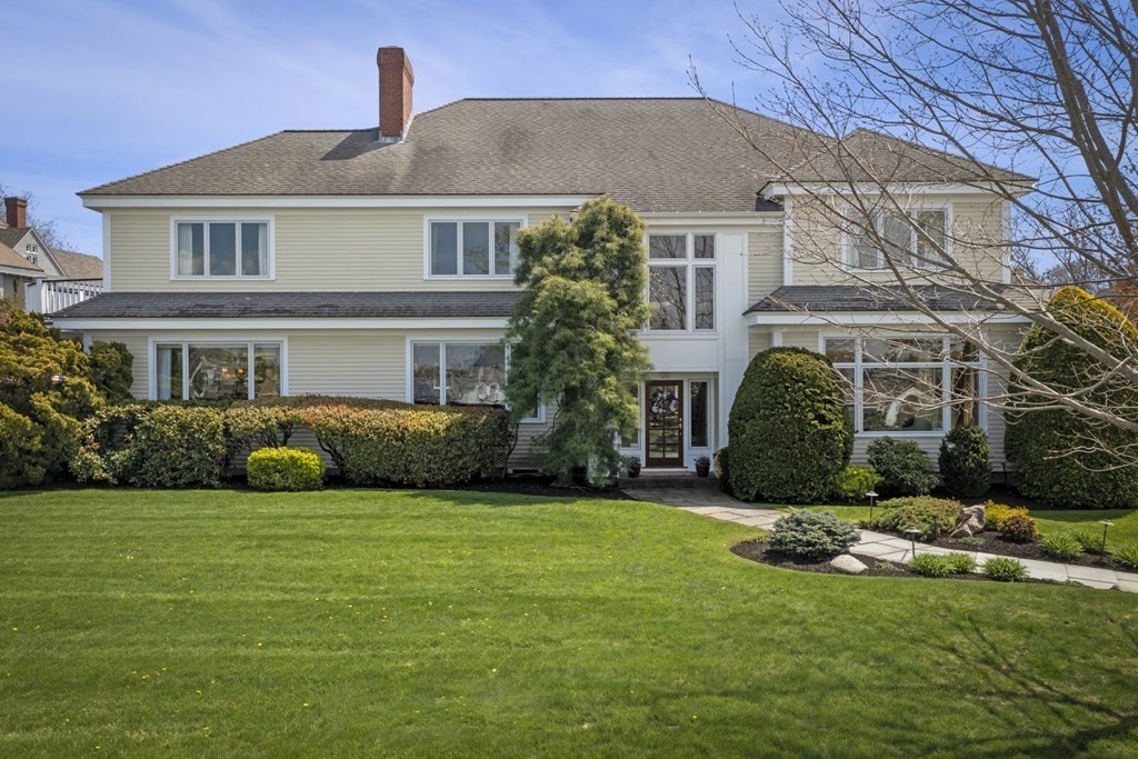 25 Foster Street Marblehead, MA 01945 - Photo 3 of 42 a view of a house with a big yard and potted plants