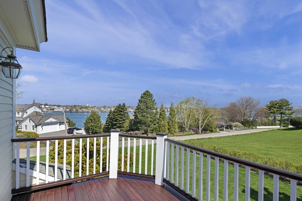 25 Foster Street Marblehead, MA 01945 - Photo 34 of 42 a view of a balcony with wooden fence