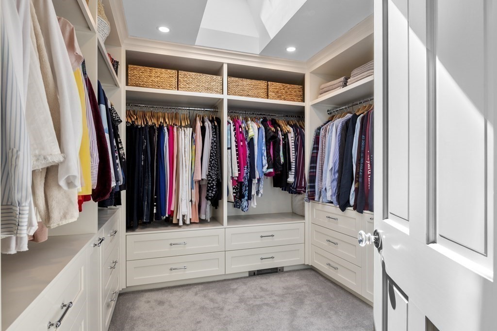 25 Foster Street Marblehead, MA 01945 - Photo 35 of 42 a view of walk in closet with clothes and shoes