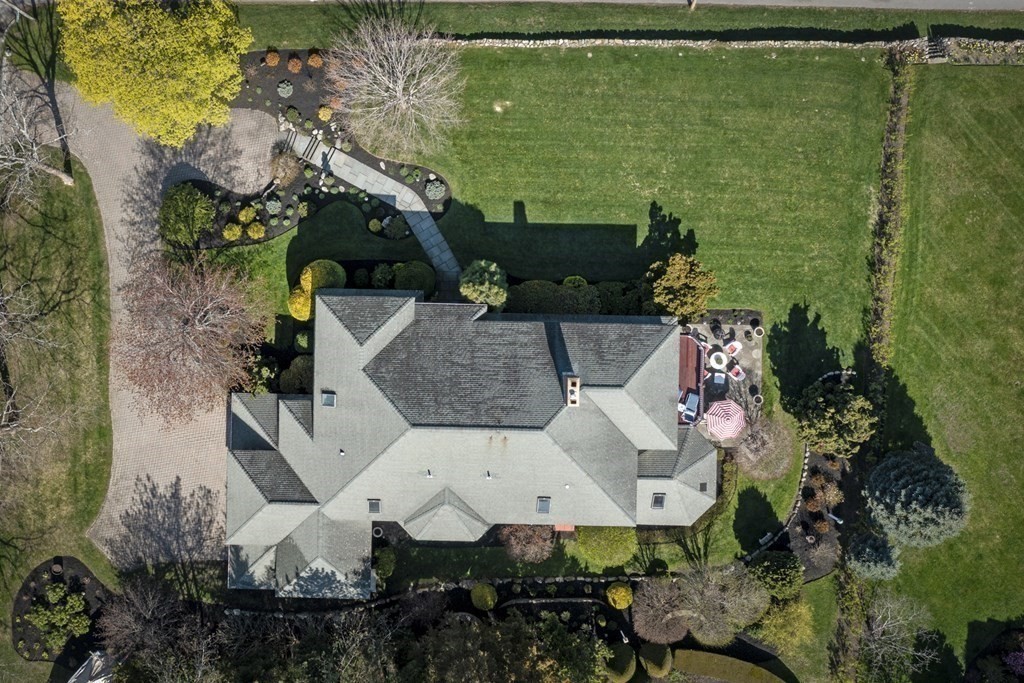 25 Foster Street Marblehead, MA 01945 - Photo 42 of 42 an aerial view of a house with a garden and lake view
