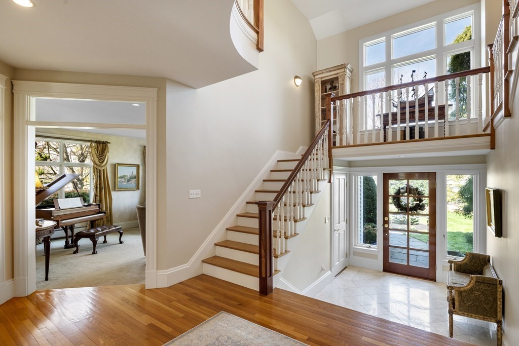 25 Foster Street Marblehead, MA 01945 - Photo 8 of 42 a view of entryway and hall with wooden floor
