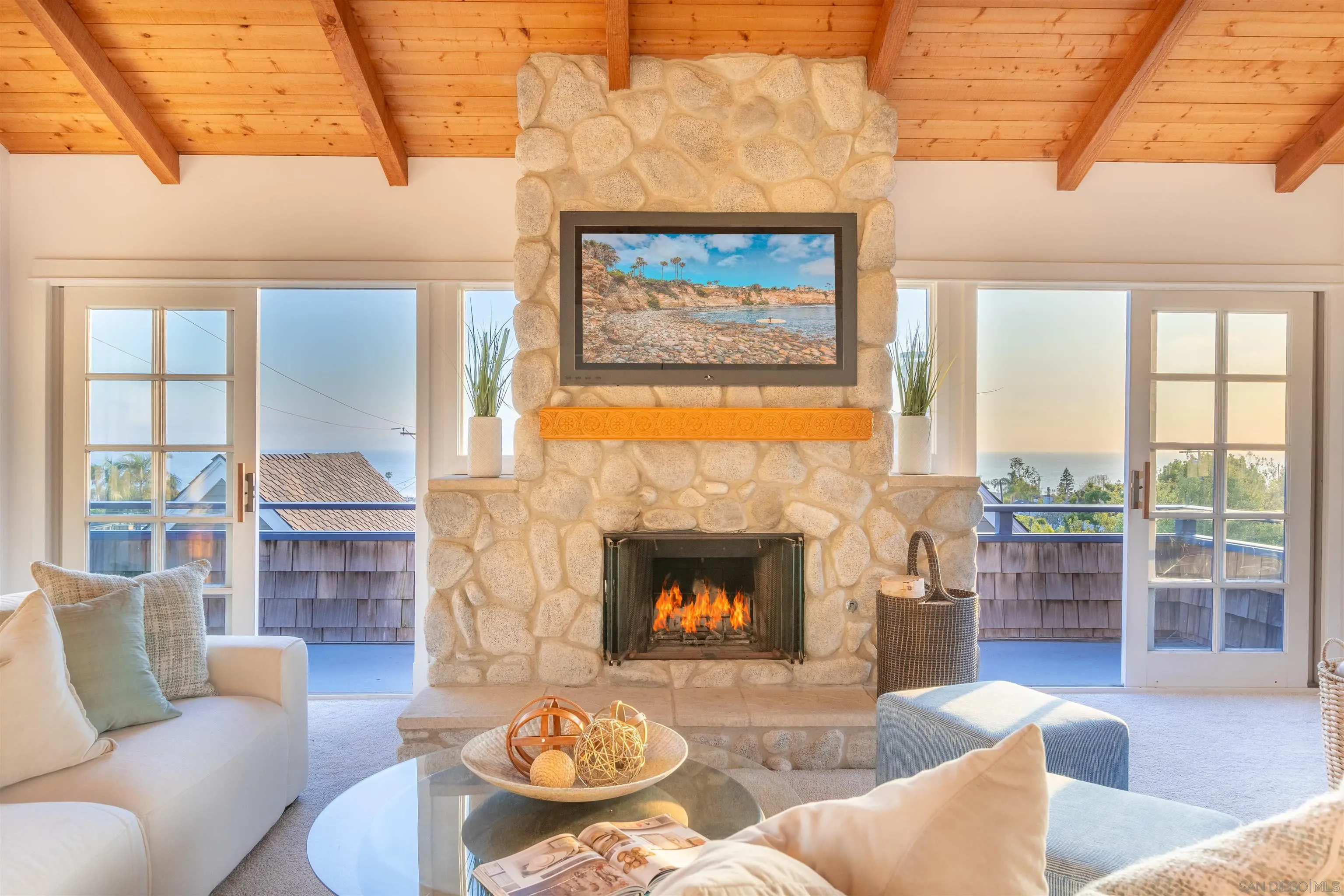 1041 Temple Terrace Laguna Beach, CA 92651 - Photo 18 of 43 a living room with furniture and a fireplace