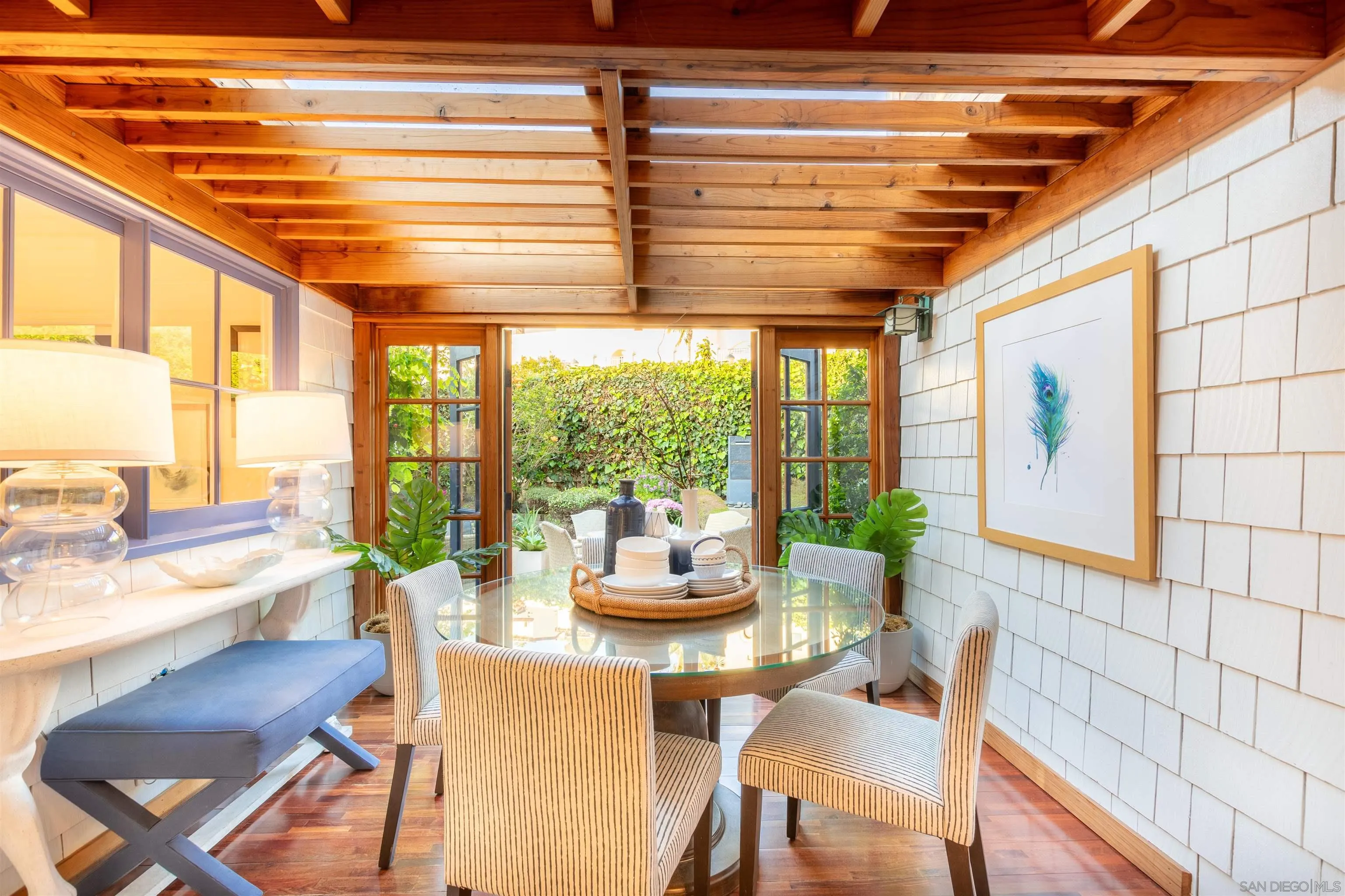 1041 Temple Terrace Laguna Beach, CA 92651 - Photo 19 of 43 a dining room with furniture and large windows