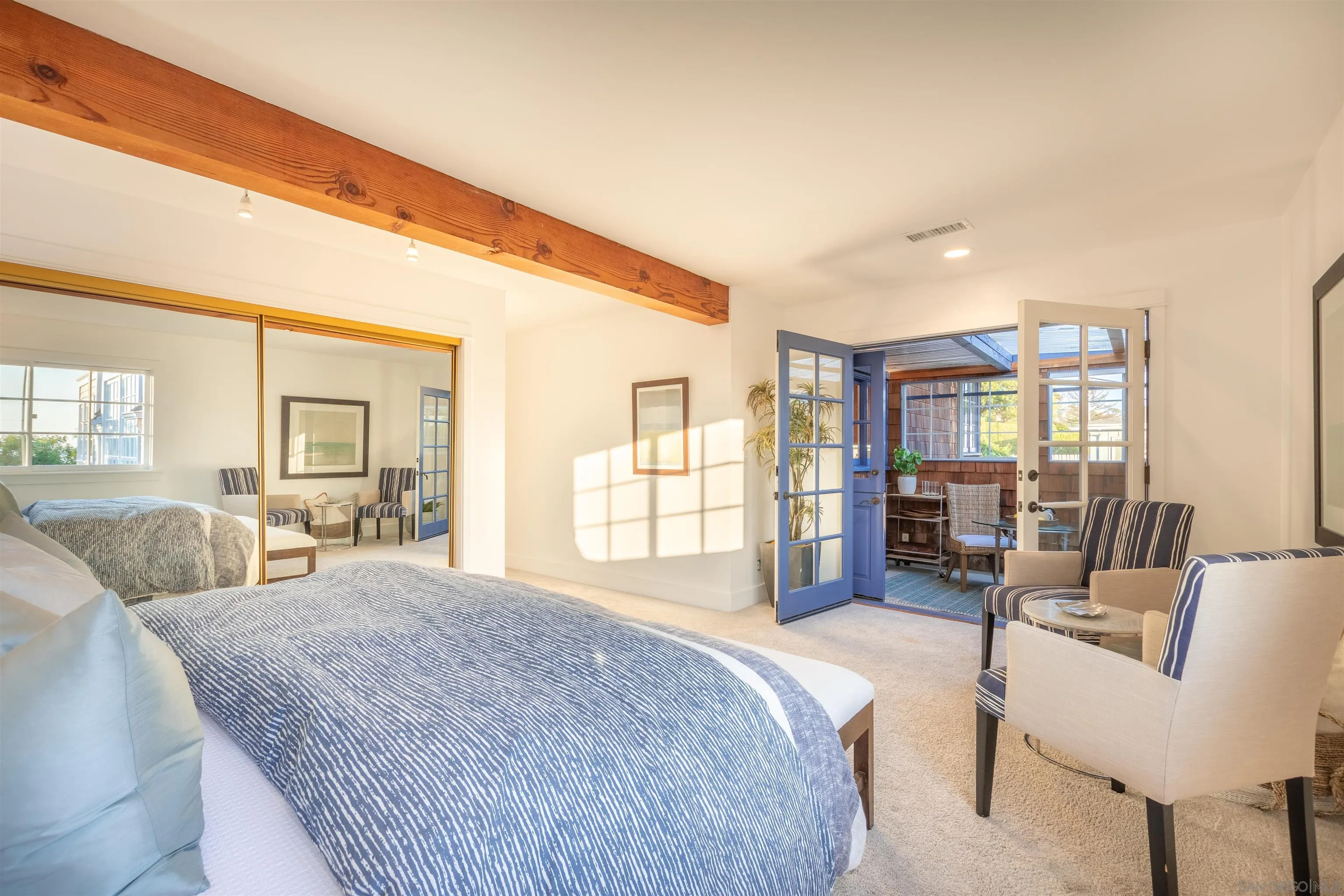 1041 Temple Terrace Laguna Beach, CA 92651 - Photo 21 of 43 a spacious bedroom with a large bed and a couch