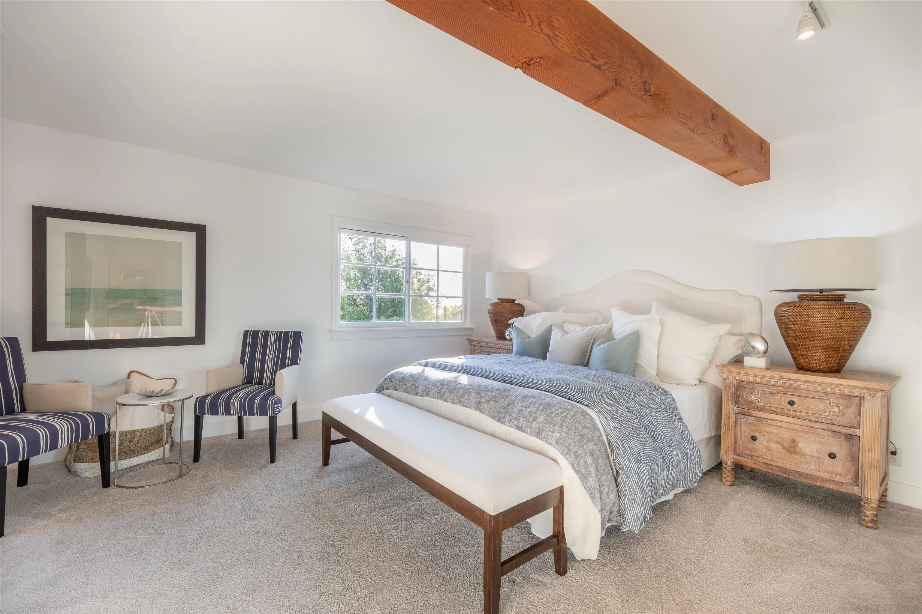 1041 Temple Terrace Laguna Beach, CA 92651 - Photo 22 of 43 a bedroom with a bed and a couch