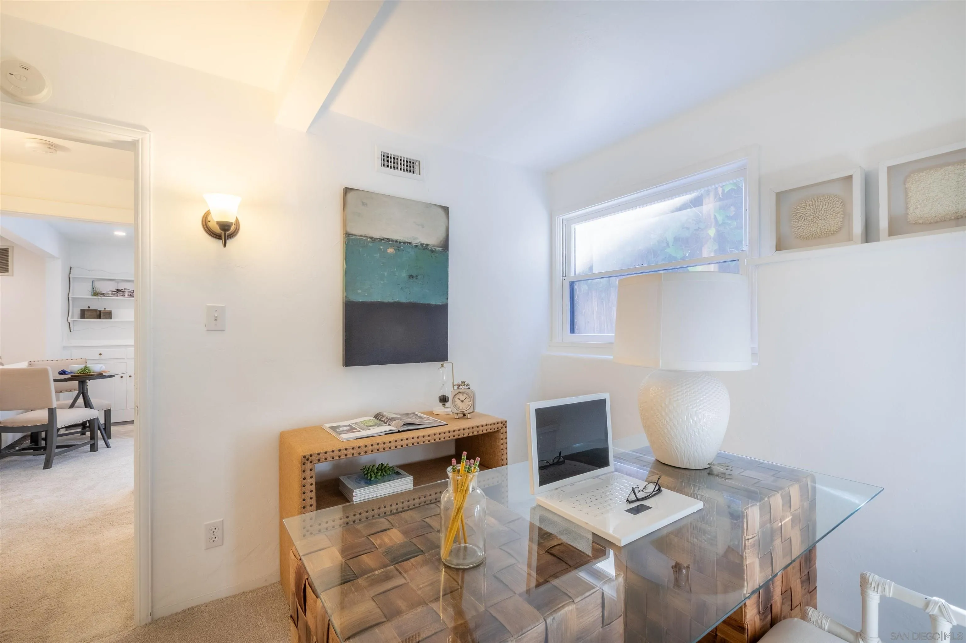 1041 Temple Terrace Laguna Beach, CA 92651 - Photo 31 of 43 a living room with furniture and a flat screen tv