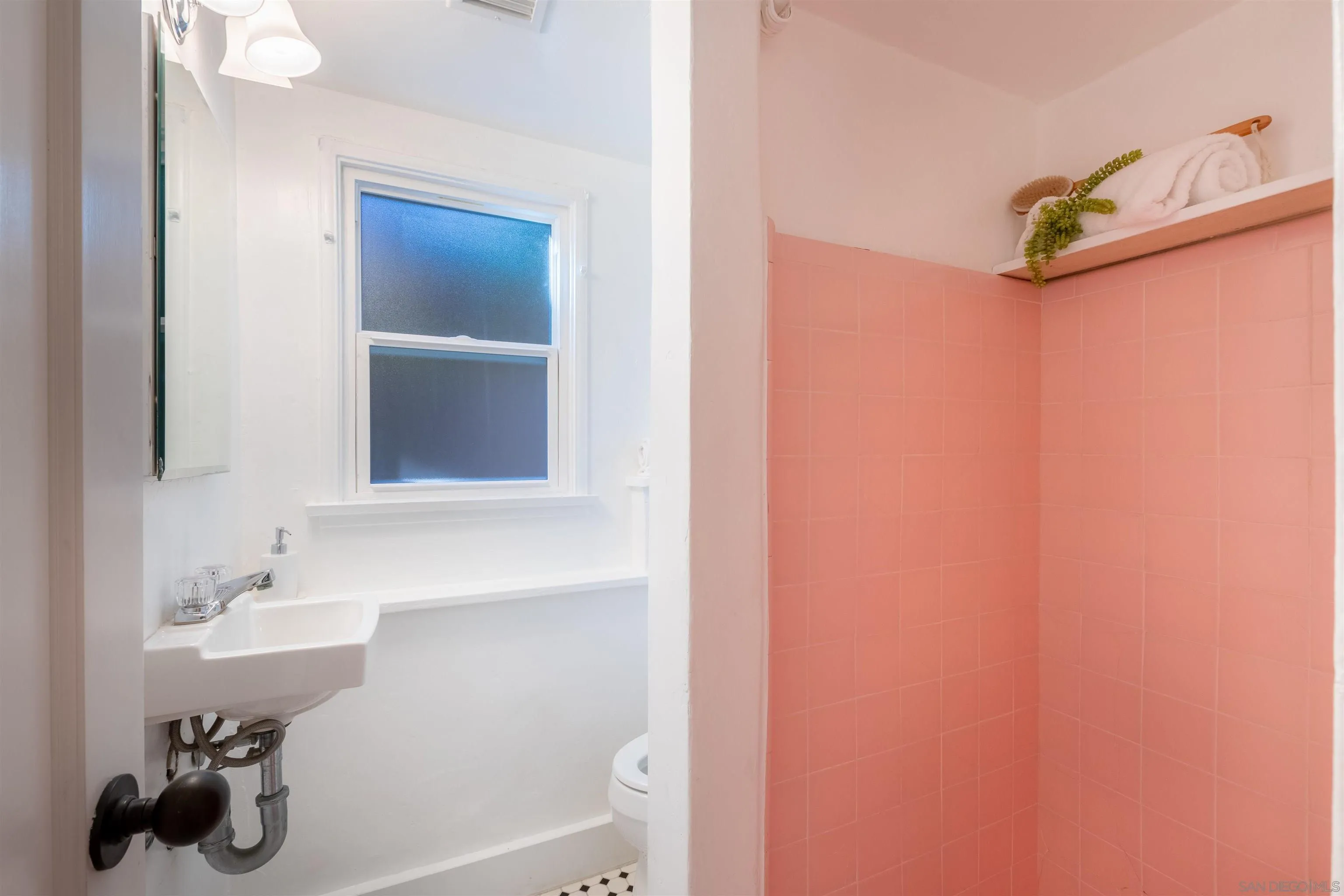 1041 Temple Terrace Laguna Beach, CA 92651 - Photo 32 of 43 a bathroom with a sink and a bathtub